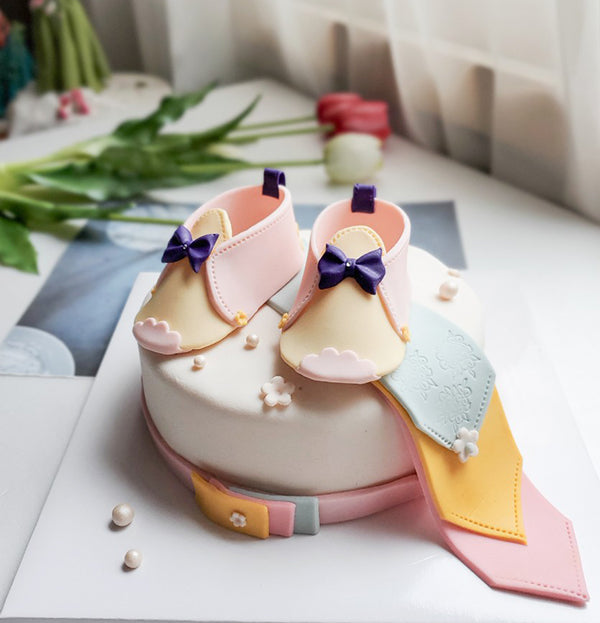 Baby shoe cake